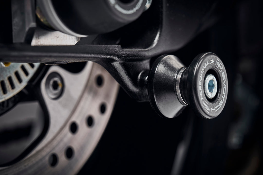 The rear wheel of the Suzuki Katana with EP Paddock Stand Bobbins installed.