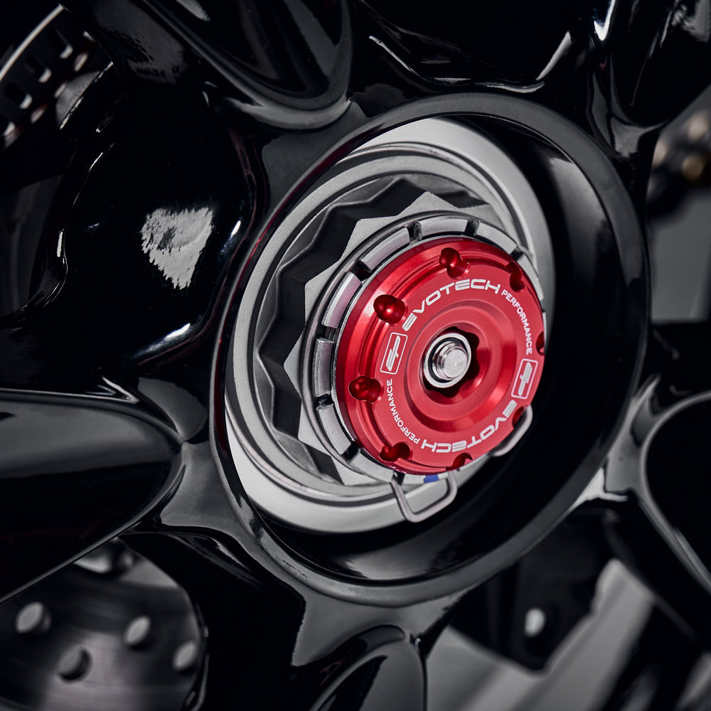 
                  
                    EP’s anodised red hub stop from EP Spindle Bobbins Crash Protection fitted to the offside rear wheel of the Triumph Speed Triple 1200 RR.
                  
                