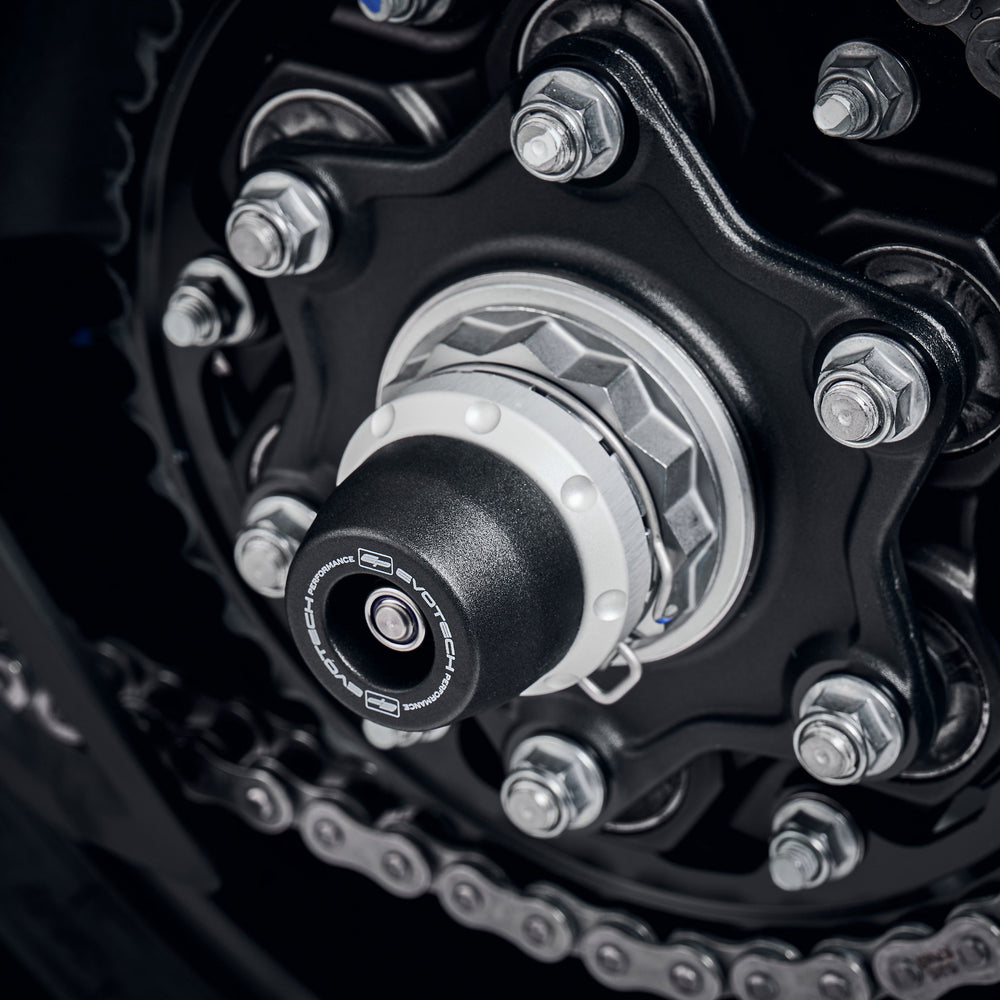 EP Spindle Bobbins Kit is fitted to the rear wheel of the Triumph Speed Triple 1200 RR with nylon bobbin and aluminium spacer clearly fitted, offering robust crash protection to the swingarm and spindle retainer.