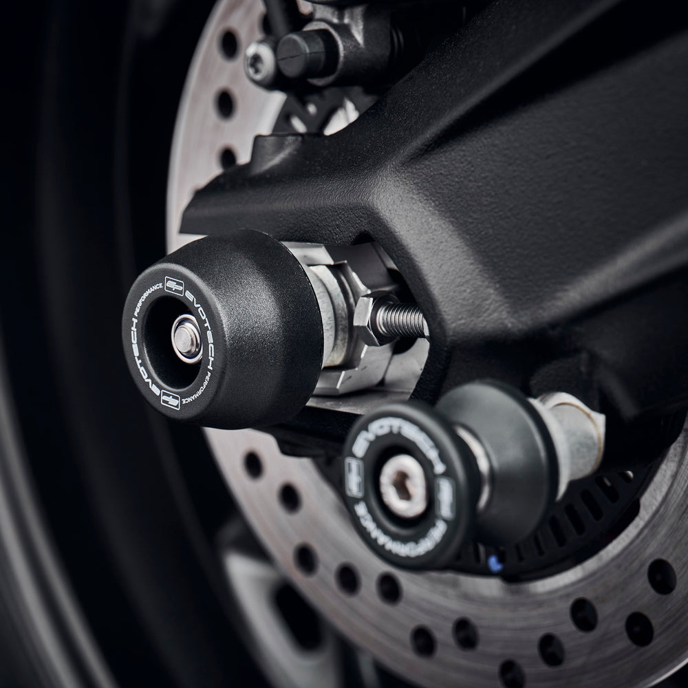 
                  
                    The rear wheel and swingarm of the Triumph Street Triple RS with EP Rear Spindle Bobbins installed to give Evotech Performance’s crash protection to the motorcycle’s rear end. 
                  
                