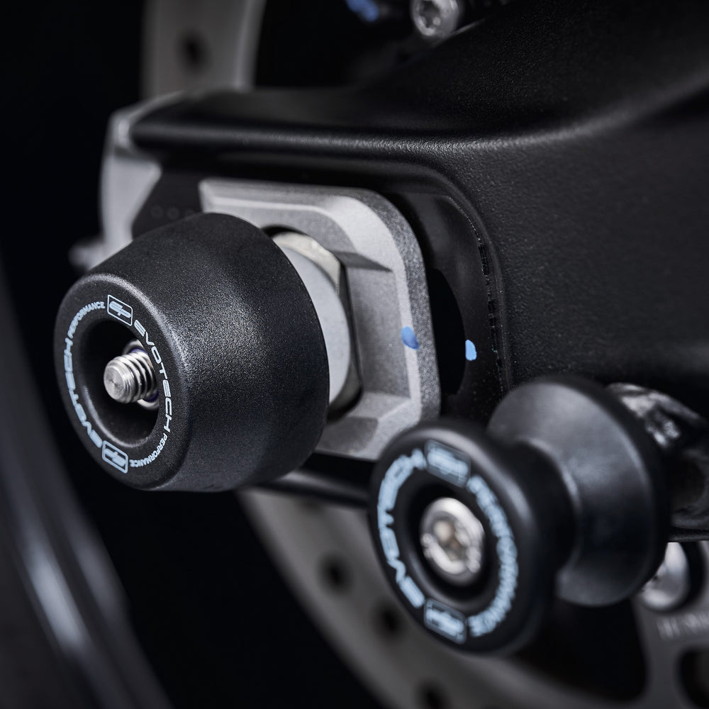 
                  
                    Evotech Performance’s signature spindle bobbin crash protection installed to protect the rear wheel and swingarm of the Triumph Tiger Sport 660.
                  
                