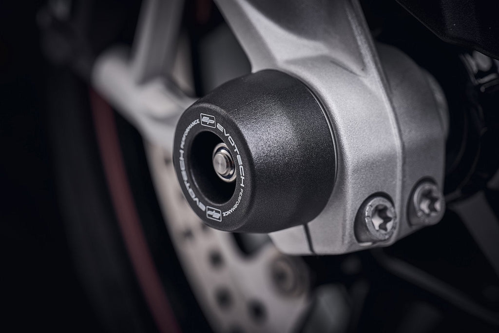 The front wheel of the BMW S1000 RR Sport with EP Spindle Bobbin precisely fitted, offering front fork and brake caliper protection.