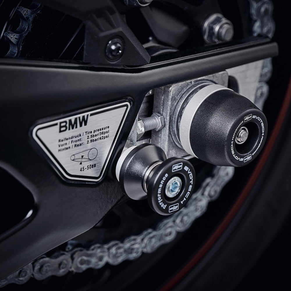 
                  
                    The nearside of the rear wheel of the BMW S 1000 R with EP Spindle Bobbins Crash Protection attached, guarding the swingarm and chain.
                  
                