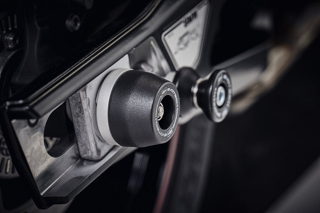 The offside rear wheel of the BMW S 1000 R with EP Spindle Bobbin secured to the swingarm and near EP Paddock Stand Bobbins.