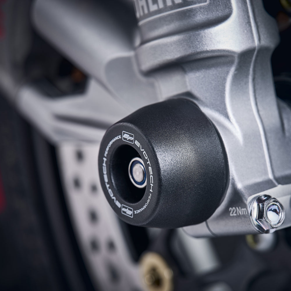 The front fork of the Honda CBR1000RR-R Fireblade SP Carbon Edition with EP Spindle Bobbin Kit crash protection bobbin attached seamlessly.