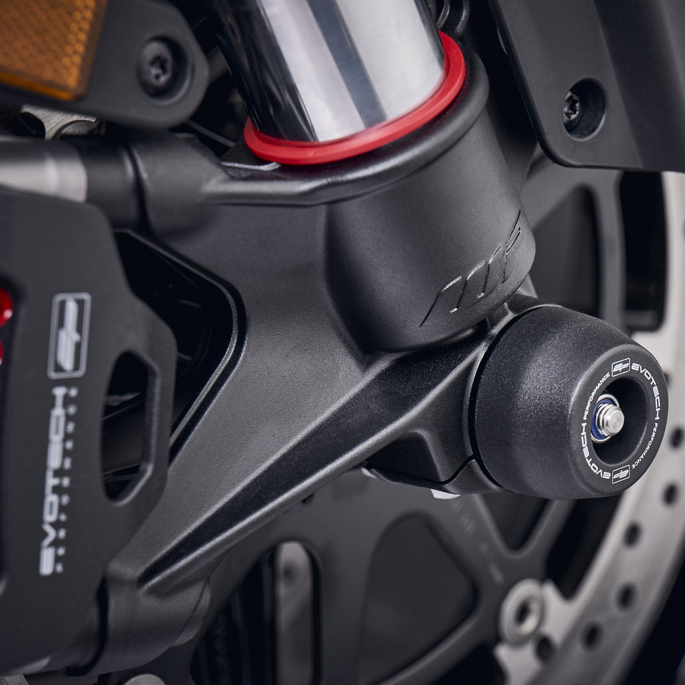 The injection-moulded nylon crash bung of EP Front Spindle Bobbins installed onto the front wheel of the KTM 1290 Super Duke R, giving strong crash protection to the front forks and brake calipers.