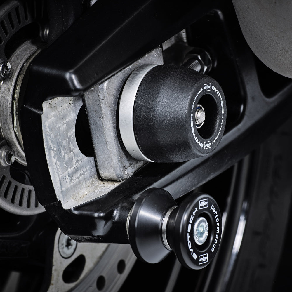 
                  
                    The offside rear wheel of the BMW S 1000 XR TE with EP Spindle Bobbin secured to the swingarm and near EP Paddock Stand Bobbins.
                  
                