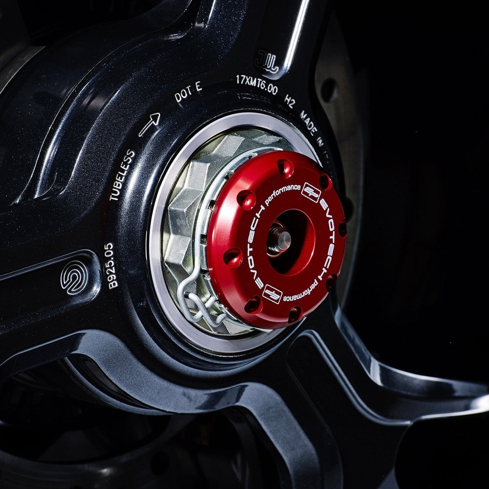 
                  
                    The attractive anodised red hub stop from the EP Spindle Bobbins Crash Protection Kit fitted to the offside rear wheel of the Ducati Monster 1200 R.
                  
                