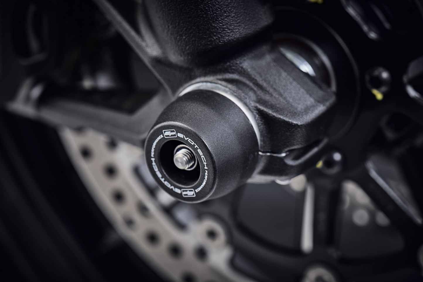 The front wheel of the Ducati Scrambler 1100 Special with EP Spindle Bobbins Crash Protection Kit fitted.