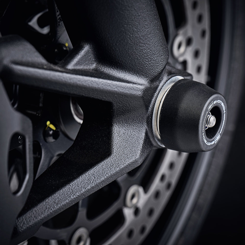 
                  
                    EP Spindle Bobbins Paddock Kit’s front wheel spindle bobbin crash protection seamlessly attached to the front wheel of the Ducati Scrambler 1100 Tribute Pro. 
                  
                