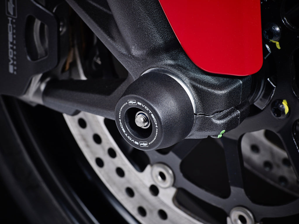 The front wheel, fork and brake caliper of the Ducati Monster 821 Stripe with an EP crash protection spindle bobbin precisely fitted.