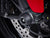 The front wheel of the Ducati Scrambler Icon featuring EP Front Spindle Bobbins crash protection, one half of the EP Spindle Bobbins Paddock Kit. 