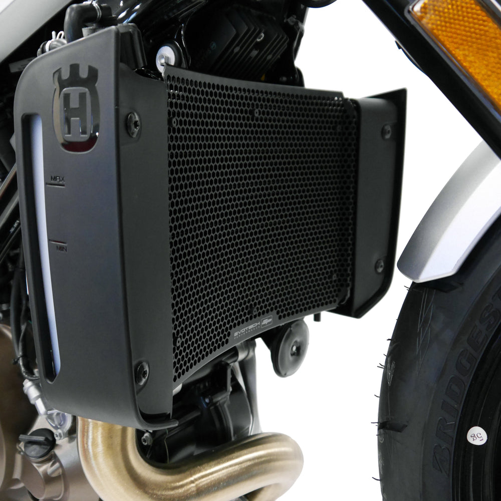 
                  
                    Side facing view of EP Radiator Guard on EP Radiator Guard installed on Husqvarna Vitpilen 701 motorbike
                  
                