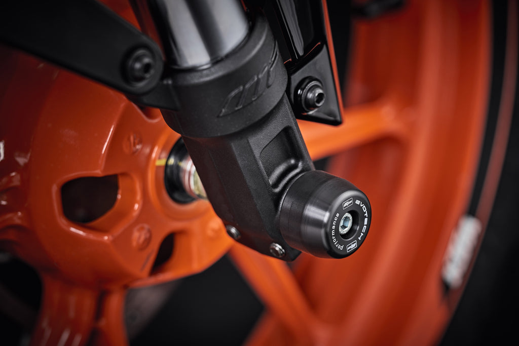 EP Front Spindle Bobbins for the KTM RC 125: Evotech Performanceâ€™s crash protection bungs seamlessly fitted to the motorcycleâ€™s front forks.