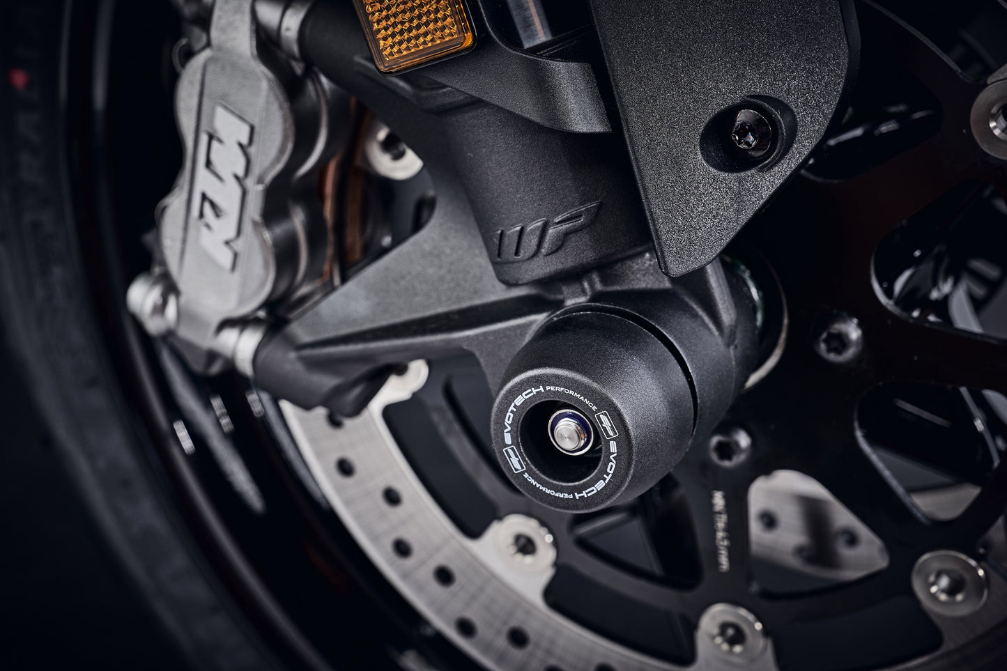 EP Front Spindle Bobbins fitted seamlessly to the KTM 890 Duke, extending from the front forks for superior crash protection.