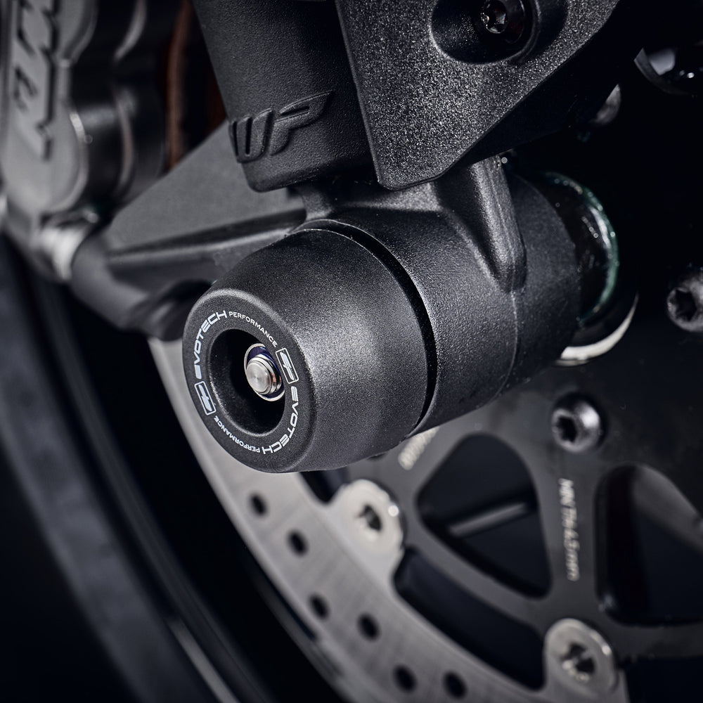 The injection-moulded nylon crash bung of EP Front Spindle Bobbins fastened onto the front wheel of the KTM 790 Duke, providing robust crash protection to the front forks and brake calipers.