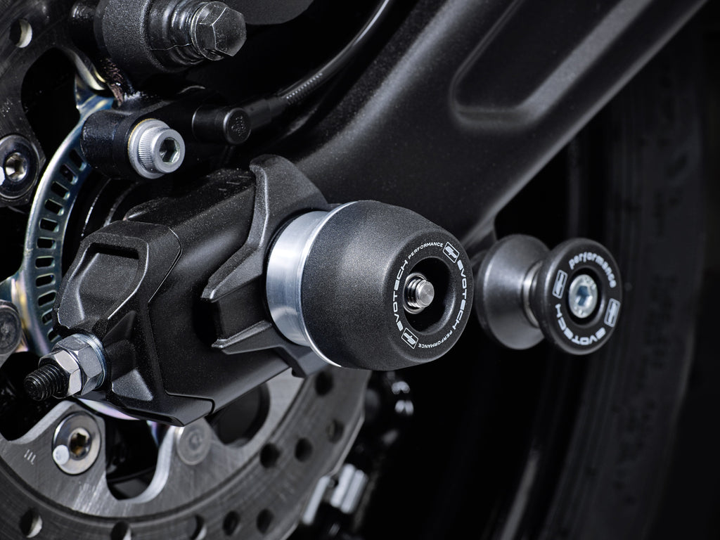 The rear wheel of the Kawasaki Ninja 650 with EP Spindle Bobbins Crash Protection bobbin mounted to the rear spindle offering swingarm protection. 