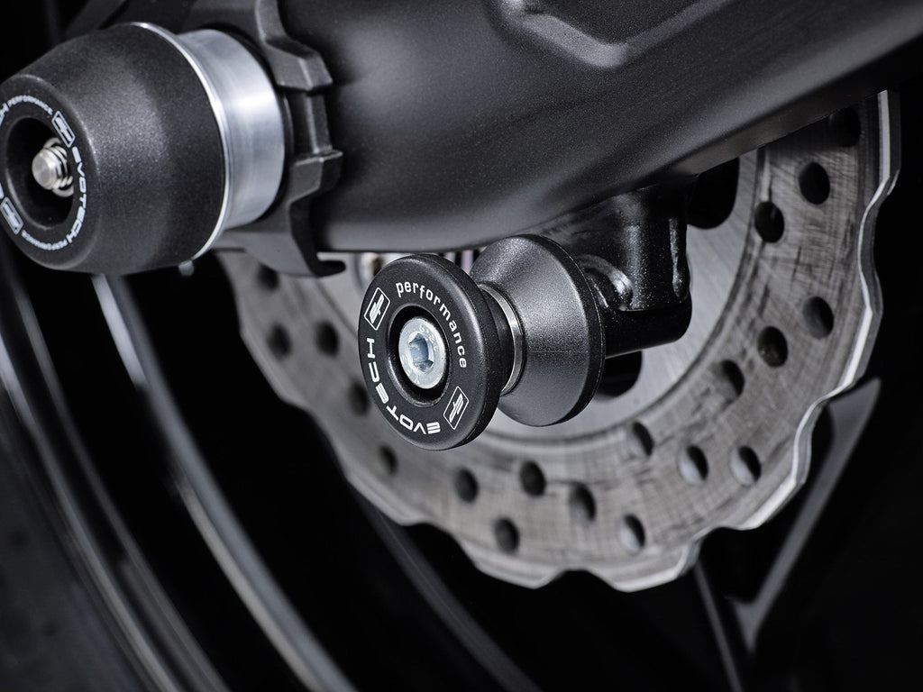 EP Paddock Stand Bobbins inserted into the offside swingarm of the Kawasaki Z650 Urban.