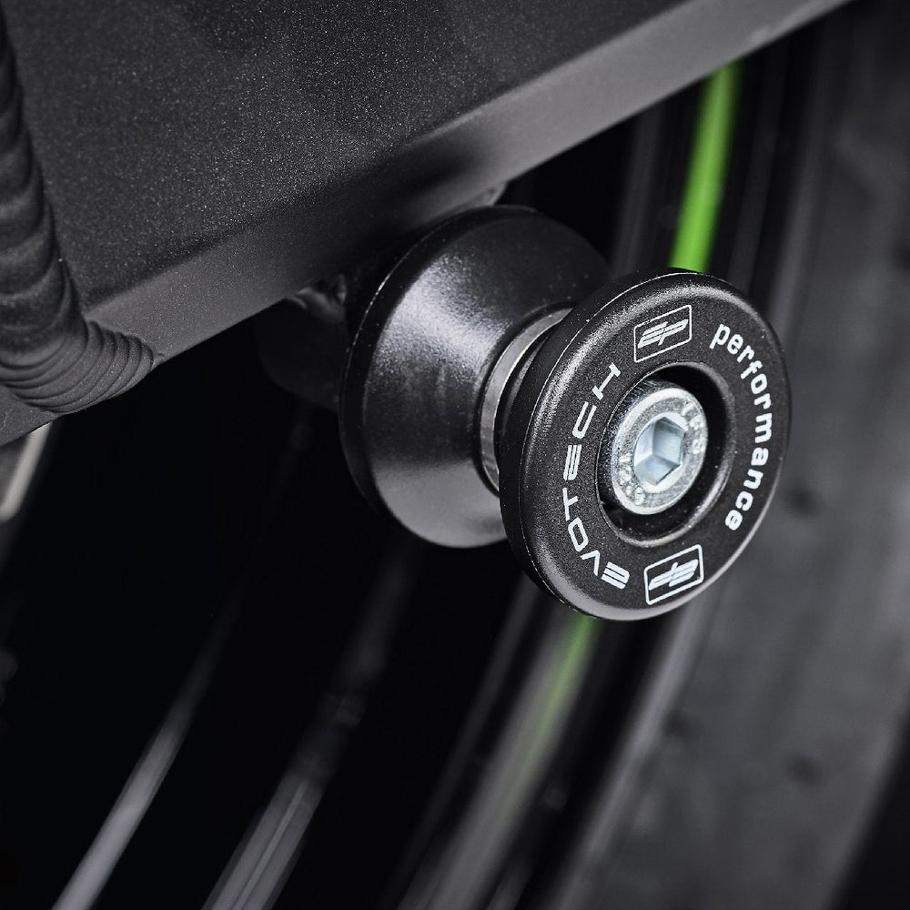 EP Paddock Stand Bobbins inserted into the swingarm of the Kawasaki Z900 Performance.