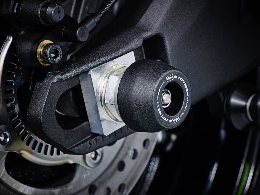 The rear wheel of the Kawasaki ZX-10RR with EP Spindle Bobbins Crash Protection bobbin mounted to the rear spindle offering swingarm protection. 