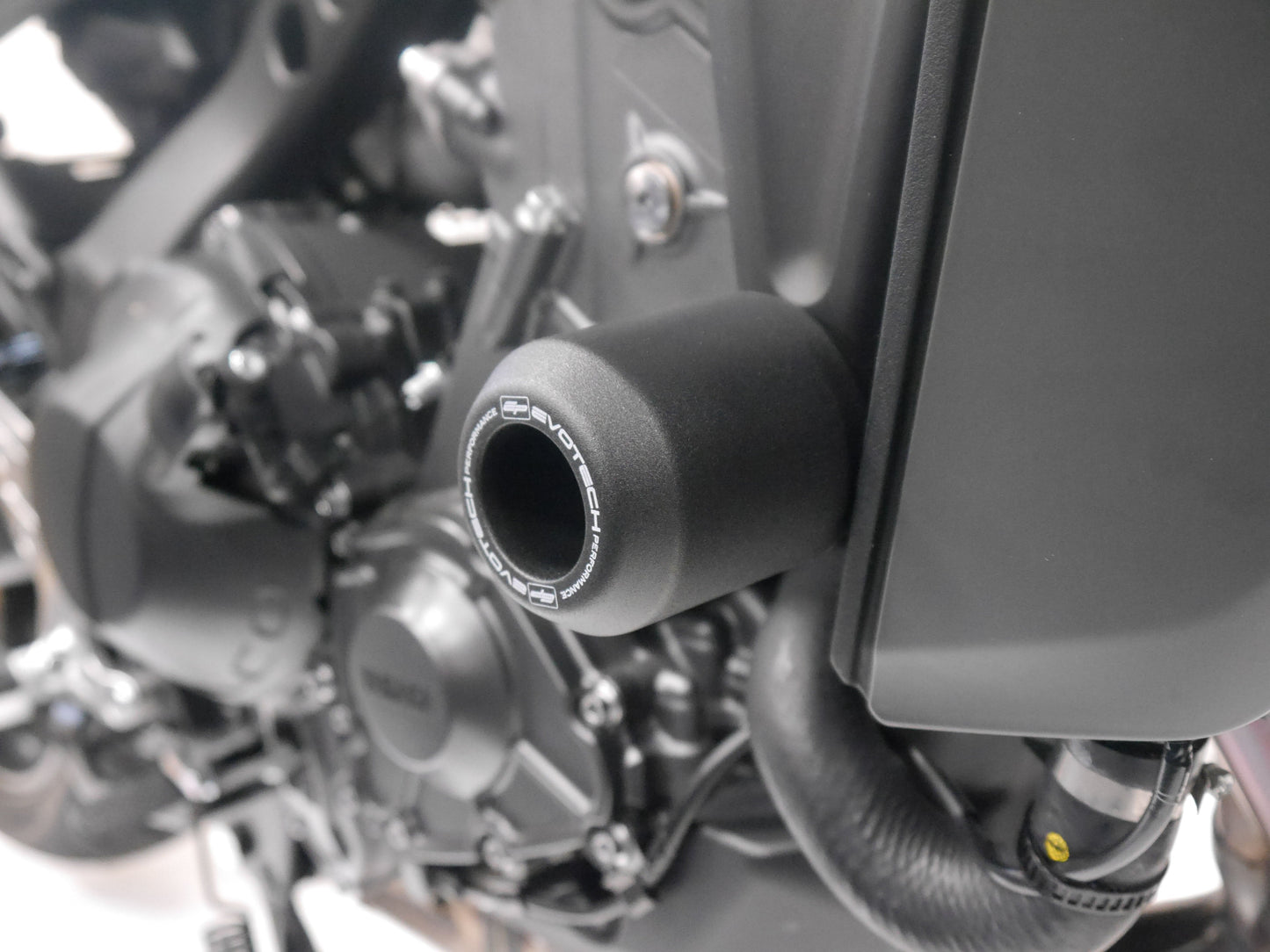 The right hand Evotech Crash Bobbin inserted into the motorcycle using the pre-existing mounting points.