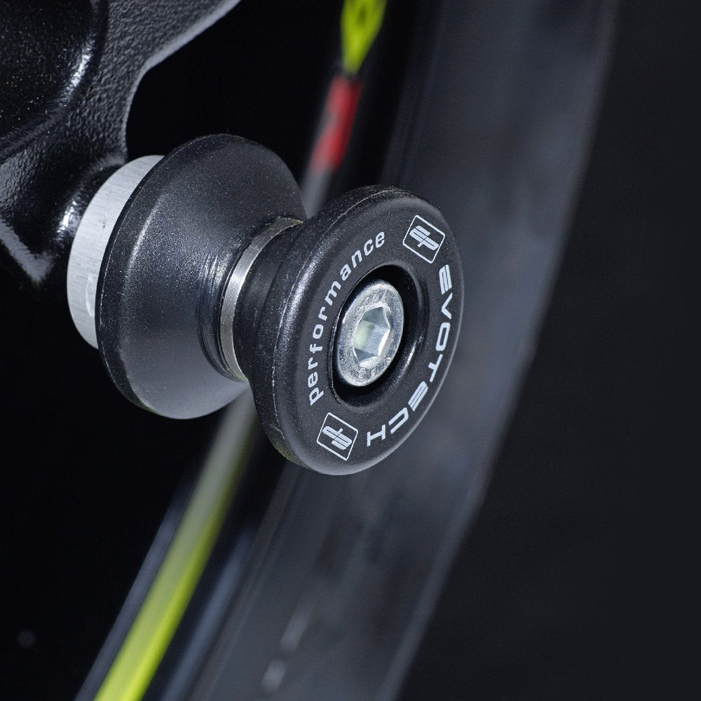 The rear wheel of the Suzuki GSX-R125 GP with EP Paddock Stand Bobbins installed.